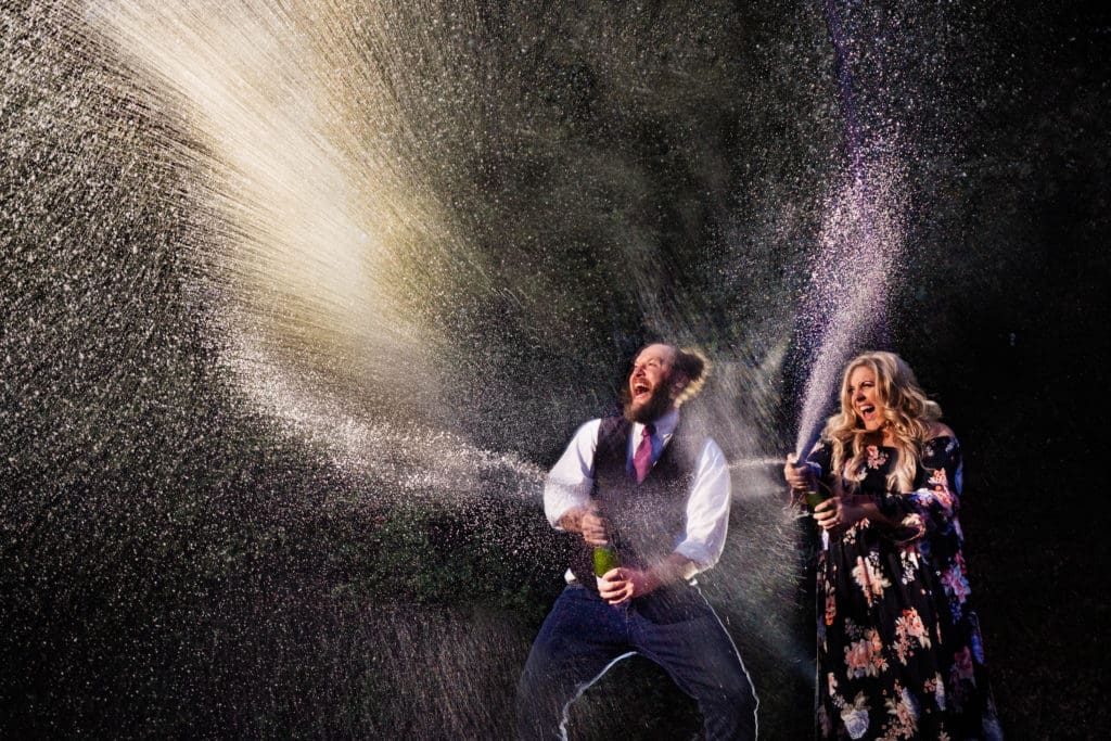 couples champagne popping photography imitation