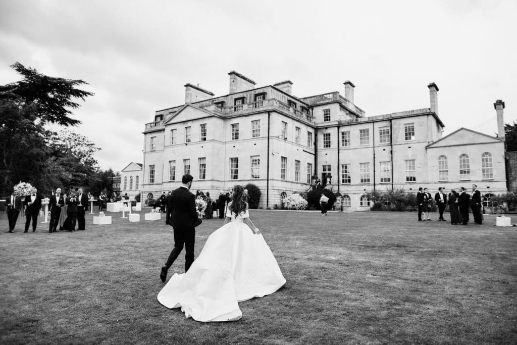 timeless portraits on grounds of wedding venue, Addington Palace.