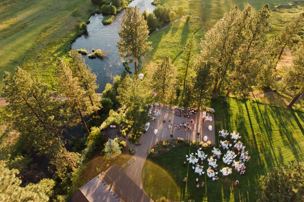 A drone point of view of a wedding reception.