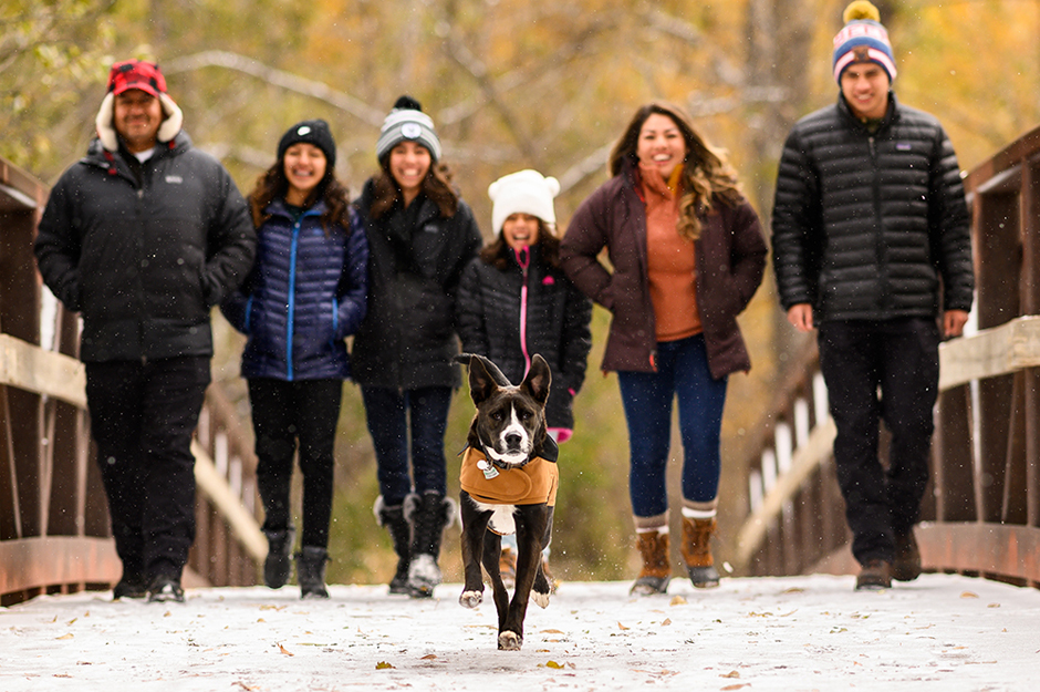 family portrait walking or strolling on bridge