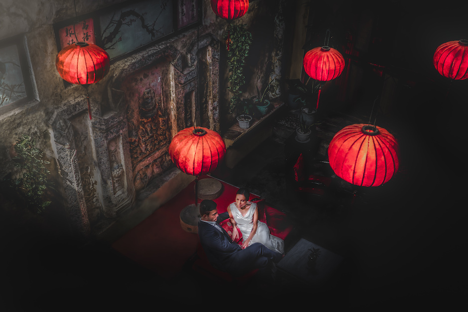 Image of bride and groom taken from above using chiaroscuro photography.