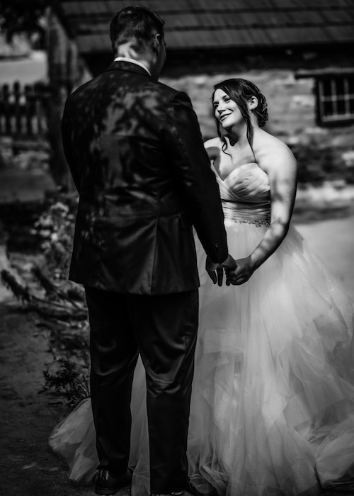 tender photo moment between bride and groom.