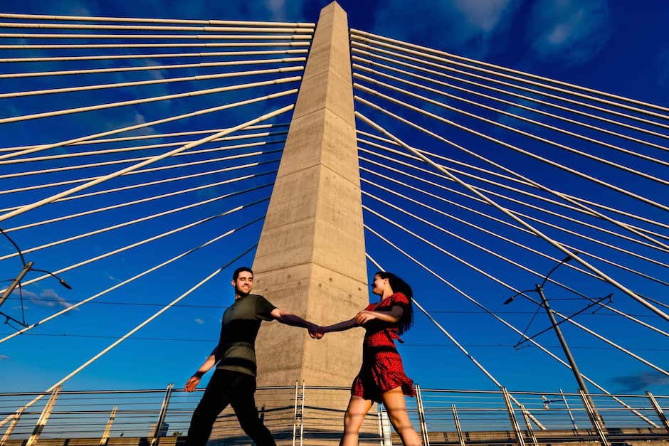 engagement couple in front of interesting building.