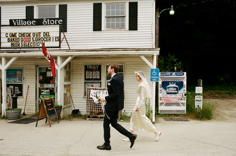 bride and groom walking to town.
