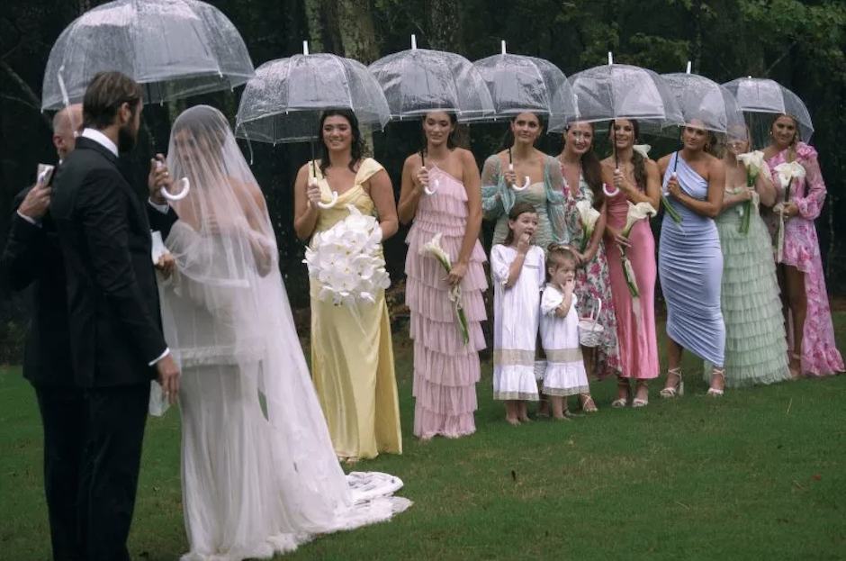 wedding party image in the rain.