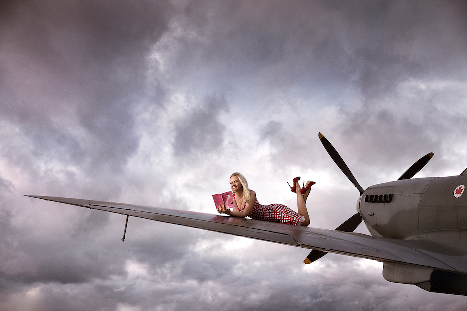 Maggie Robinson on an airplane wing.
